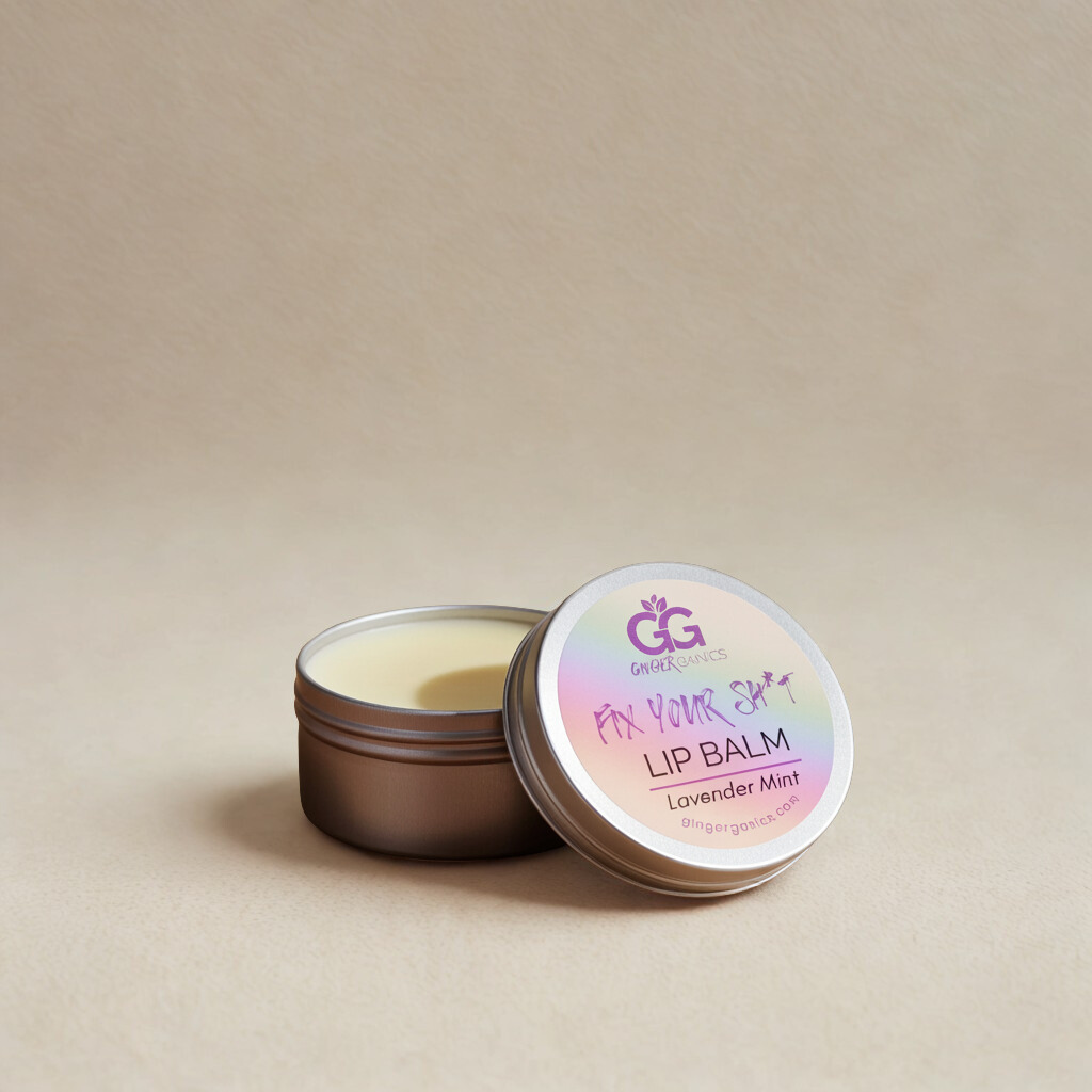 Fix Your Sh*t Lip balm container with lid open on a beige background