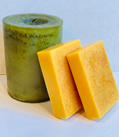 2 organic orange soap bars and candle